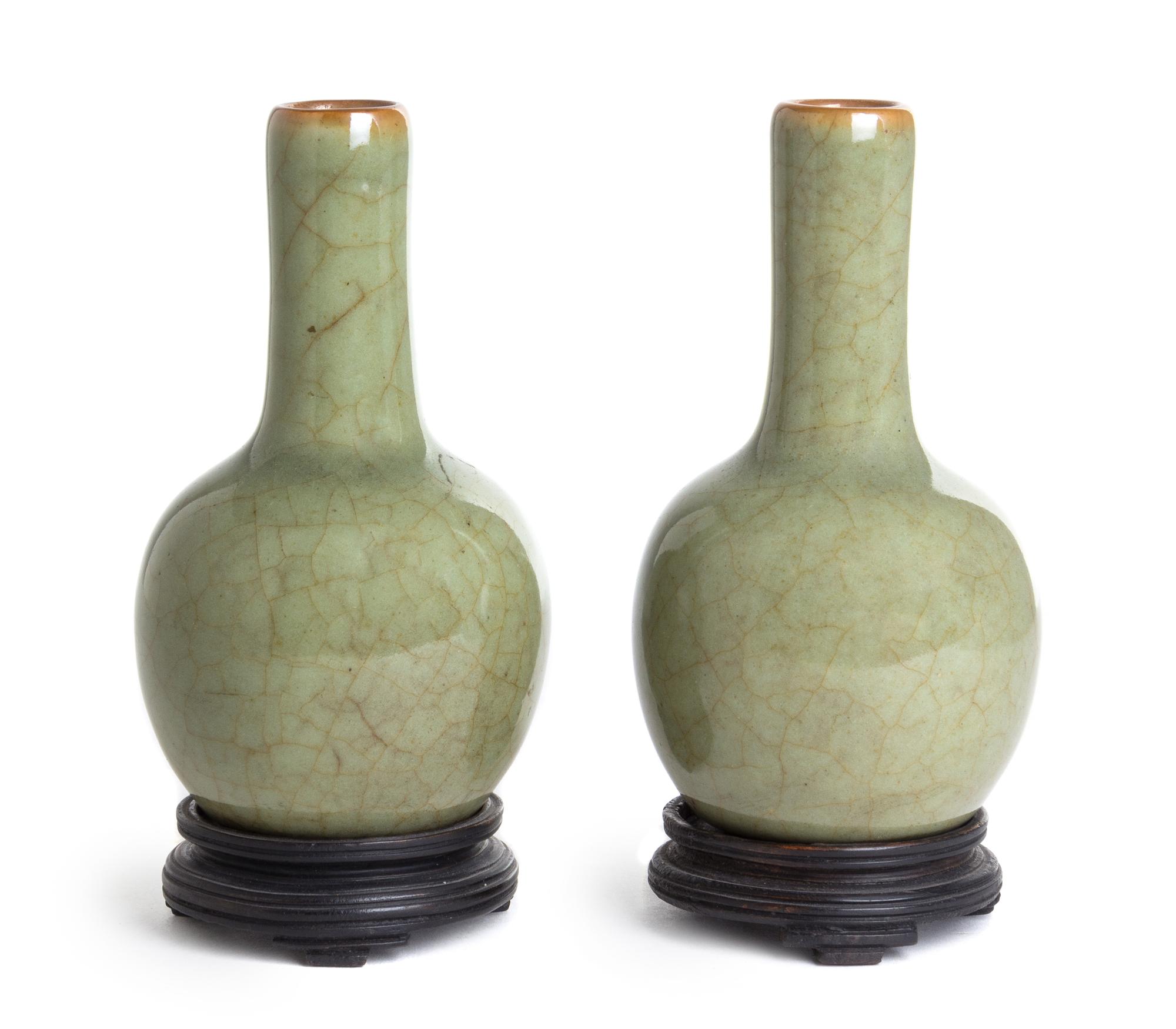 A Small Pair of Celadon Glazed Porcelain Bottle Vases Height 4 3/4 inches. — 19TH CENTURY