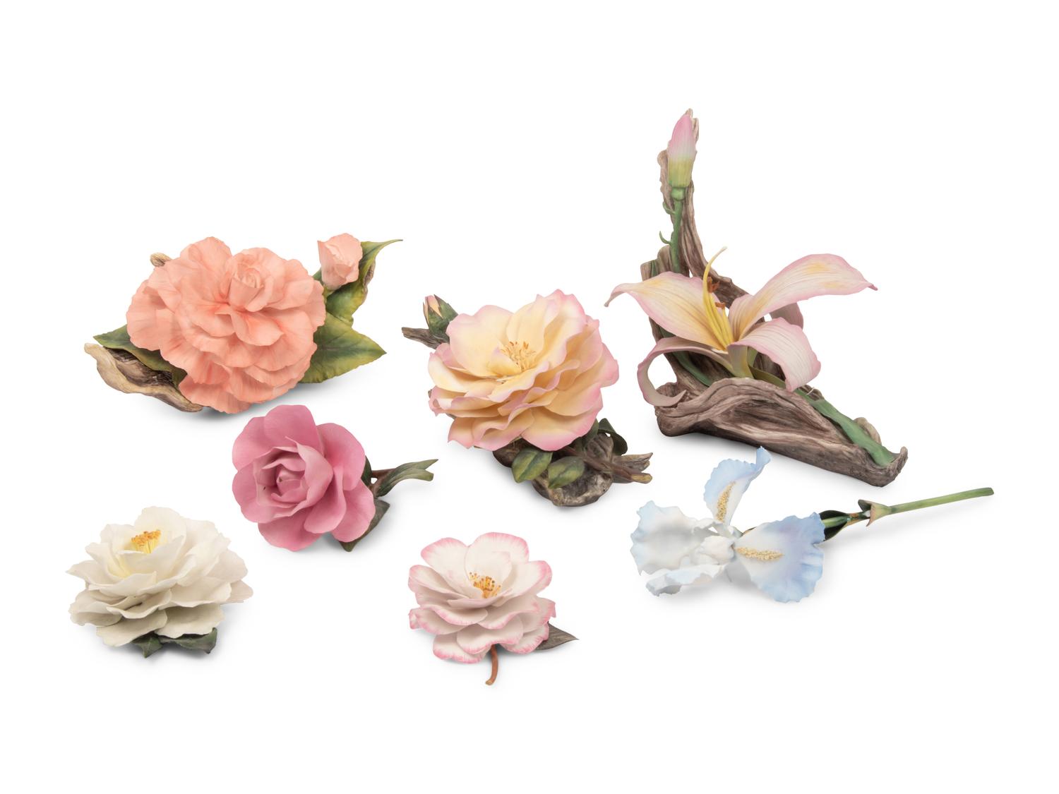 A Group of Seven Porcelain Flowers