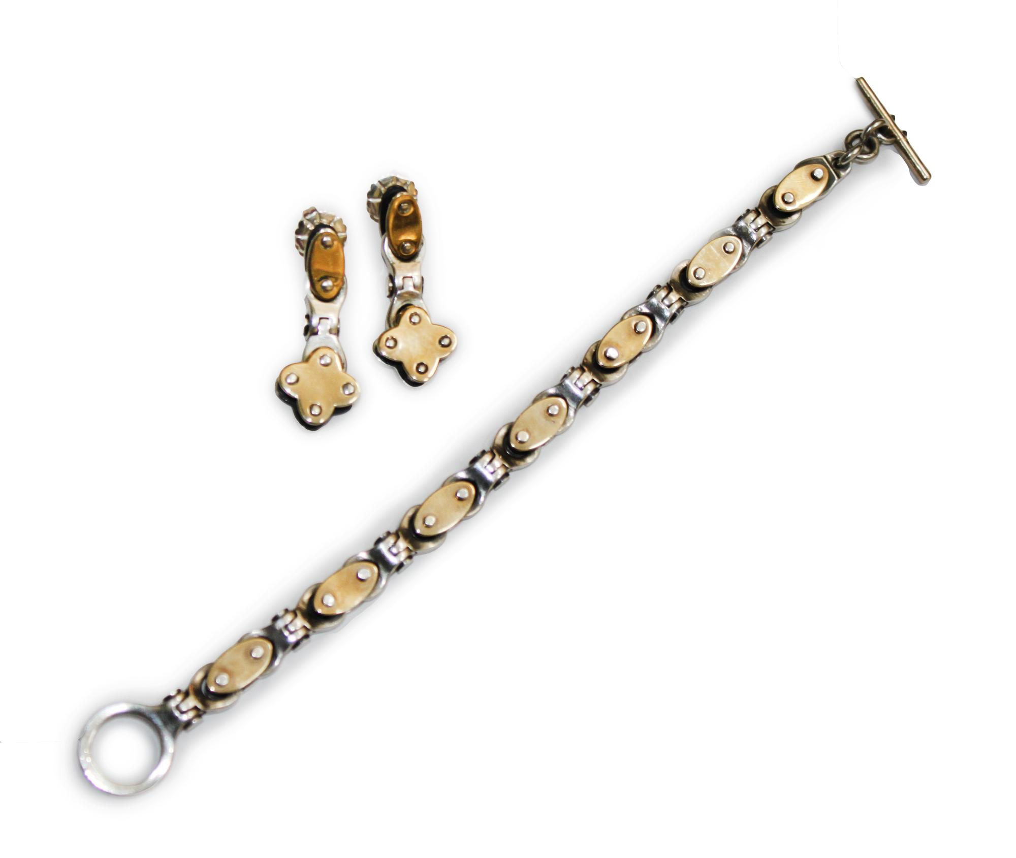 A James Reed Ltd Santa Fe, New Mexico Sterling Silver and 14 Kt Yellow Gold Bracelet