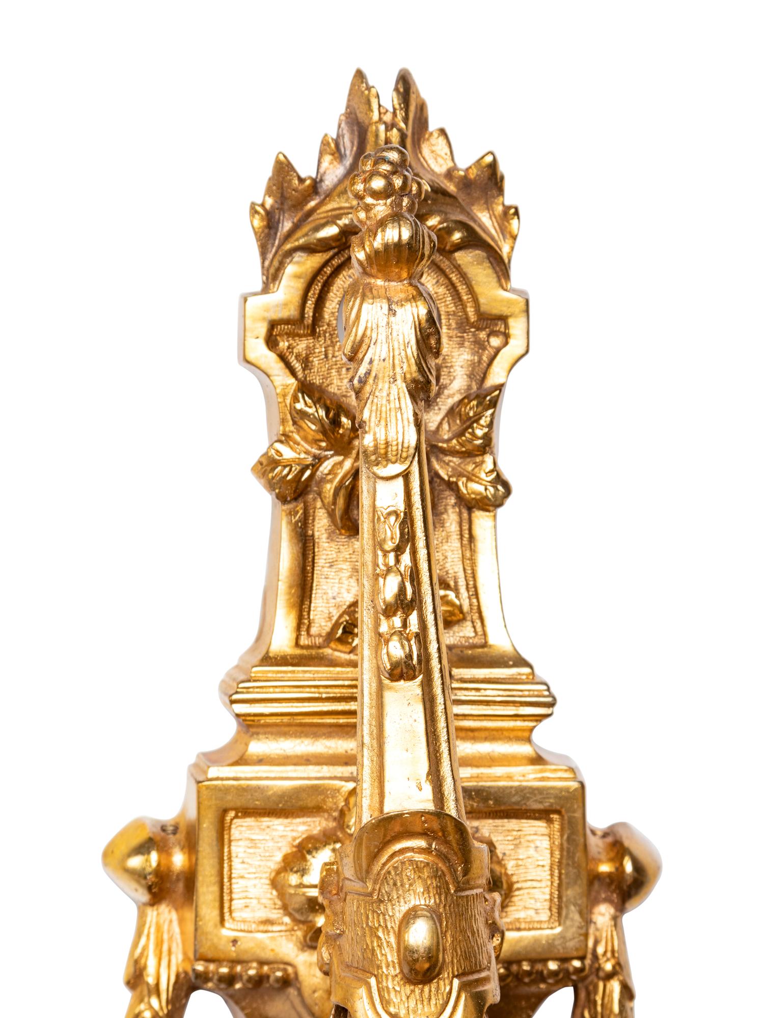 A Pair of Neoclassical Gilt Bronze Three-Light Sconces