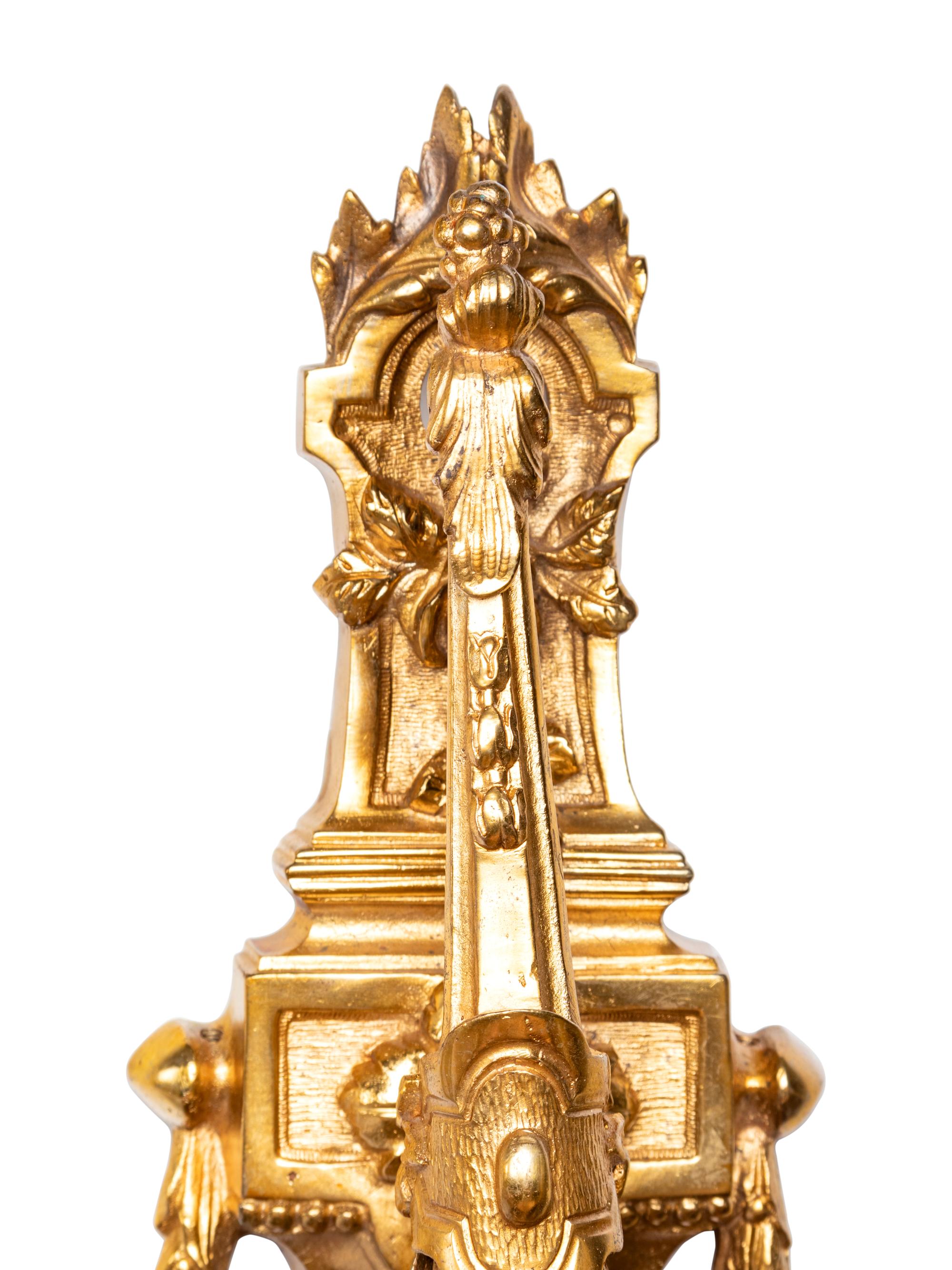 A Pair of Neoclassical Gilt Bronze Three-Light Sconces