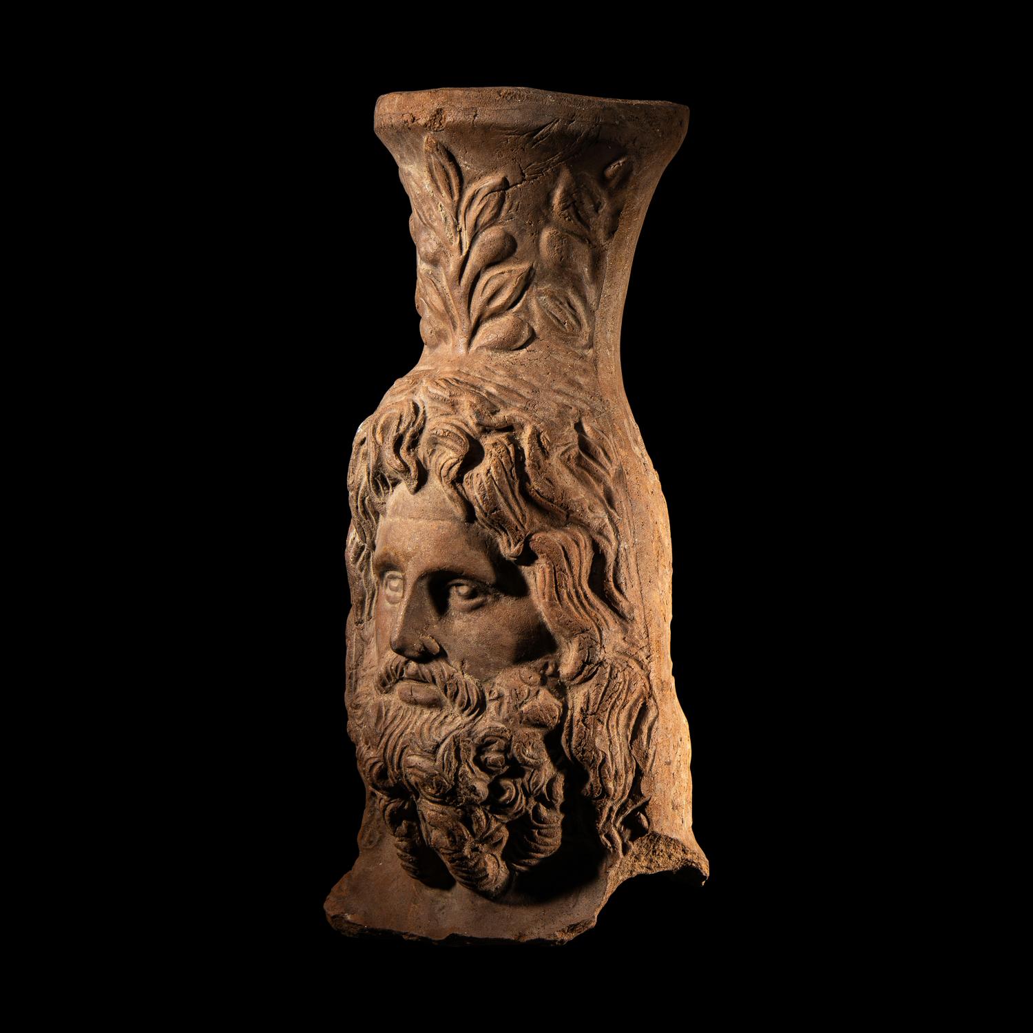A Romano-Egyptian Terracotta Head of Serapis