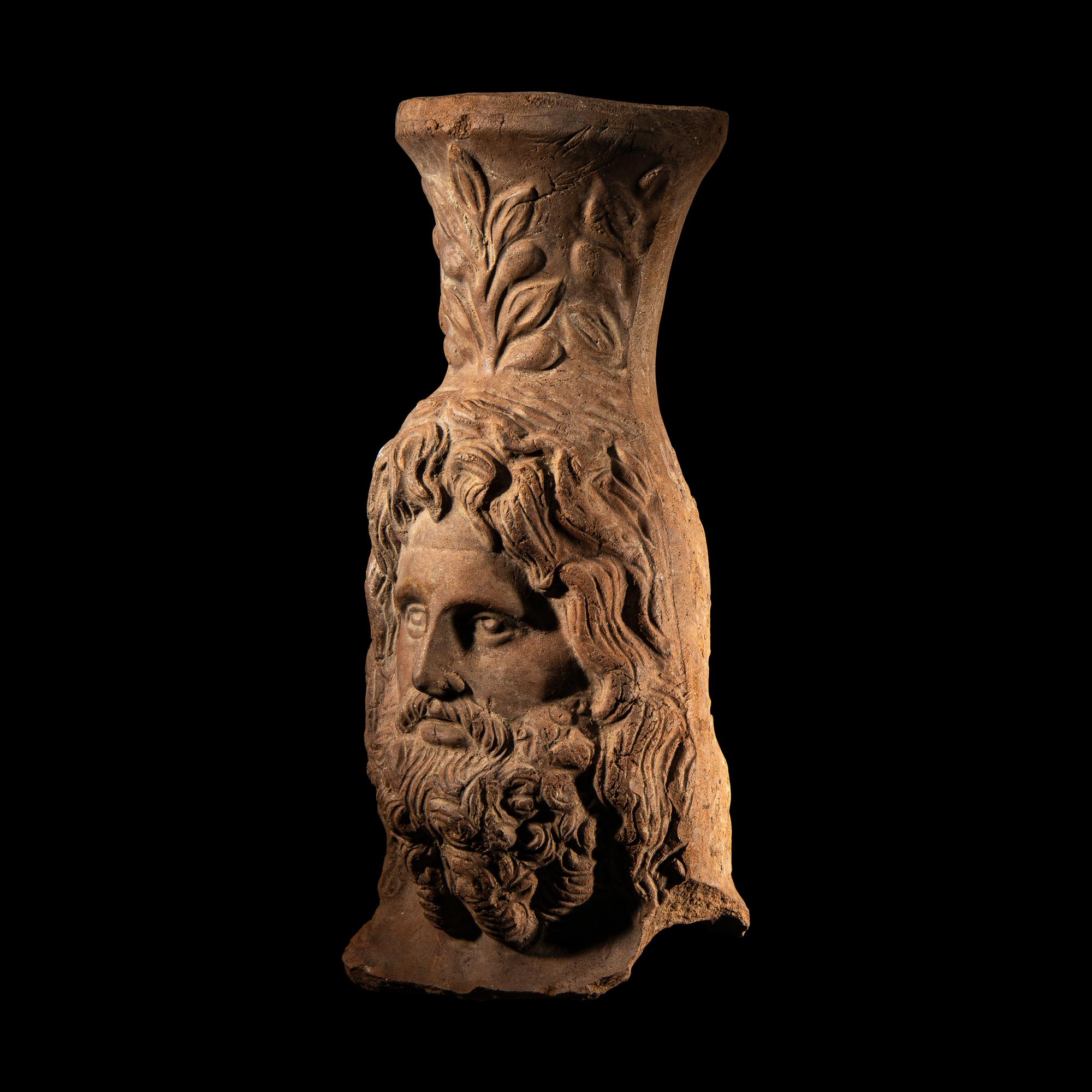 A Romano-Egyptian Terracotta Head of Serapis