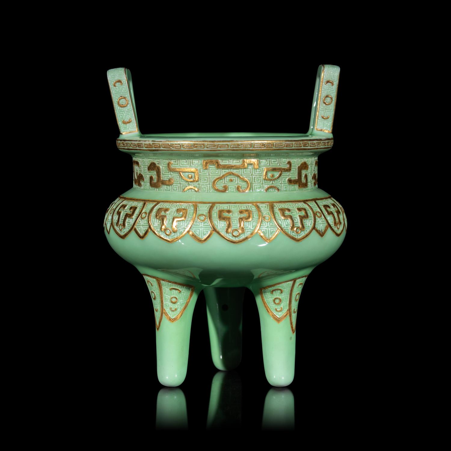 A Chinese Gilt Highlighted Green Glazed Porcelain Ding -Form Censer, Qing Dynasty 清 綠地金彩凸雕仿古鼎式爐