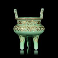 A Chinese Gilt Highlighted Green Glazed Porcelain Ding -Form Censer, Qing Dynasty 清 綠地金彩凸雕仿古鼎式爐