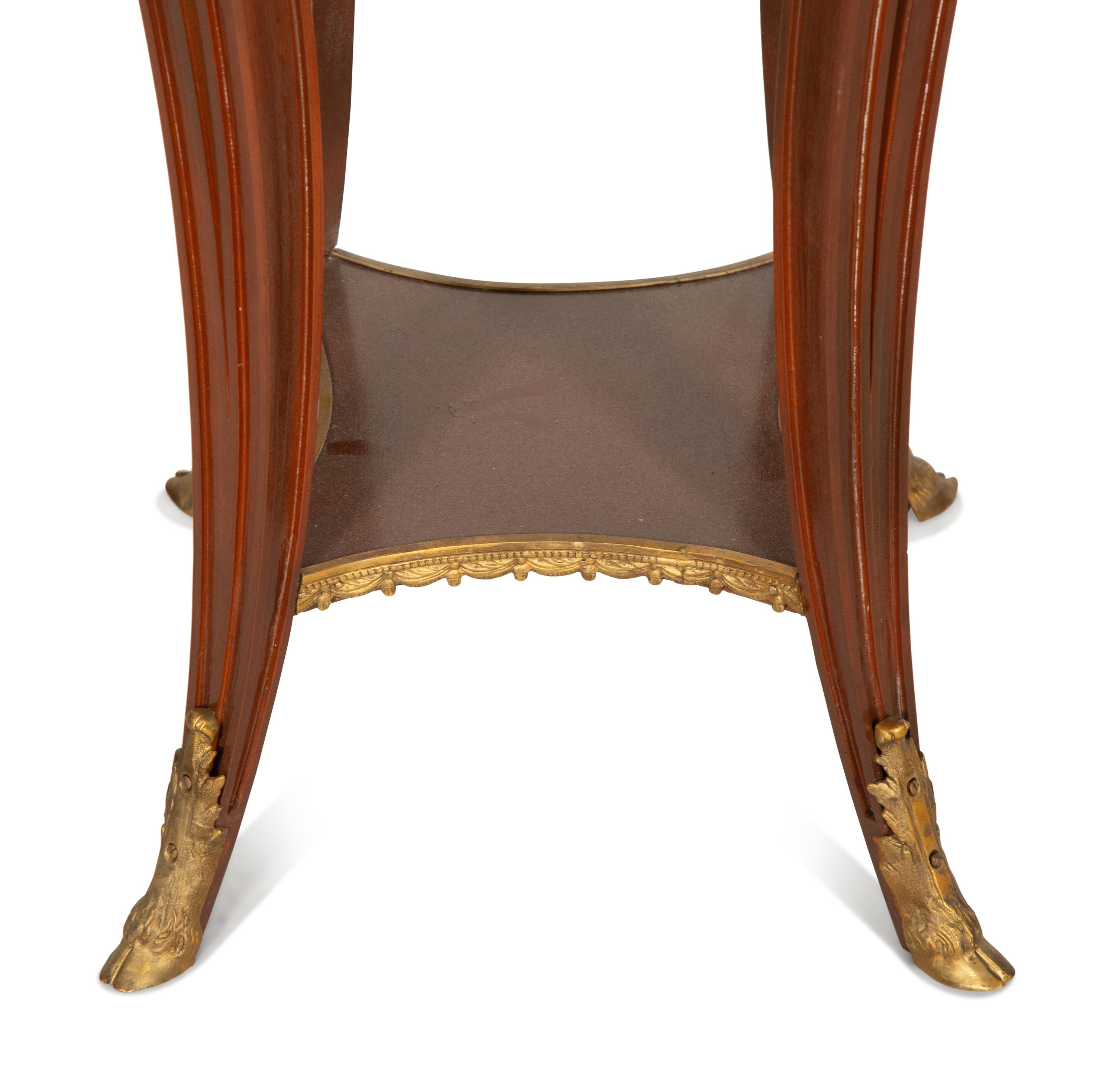 A Pair of Louis XVI Style Gilt Metal Mounted Walnut Gueridons