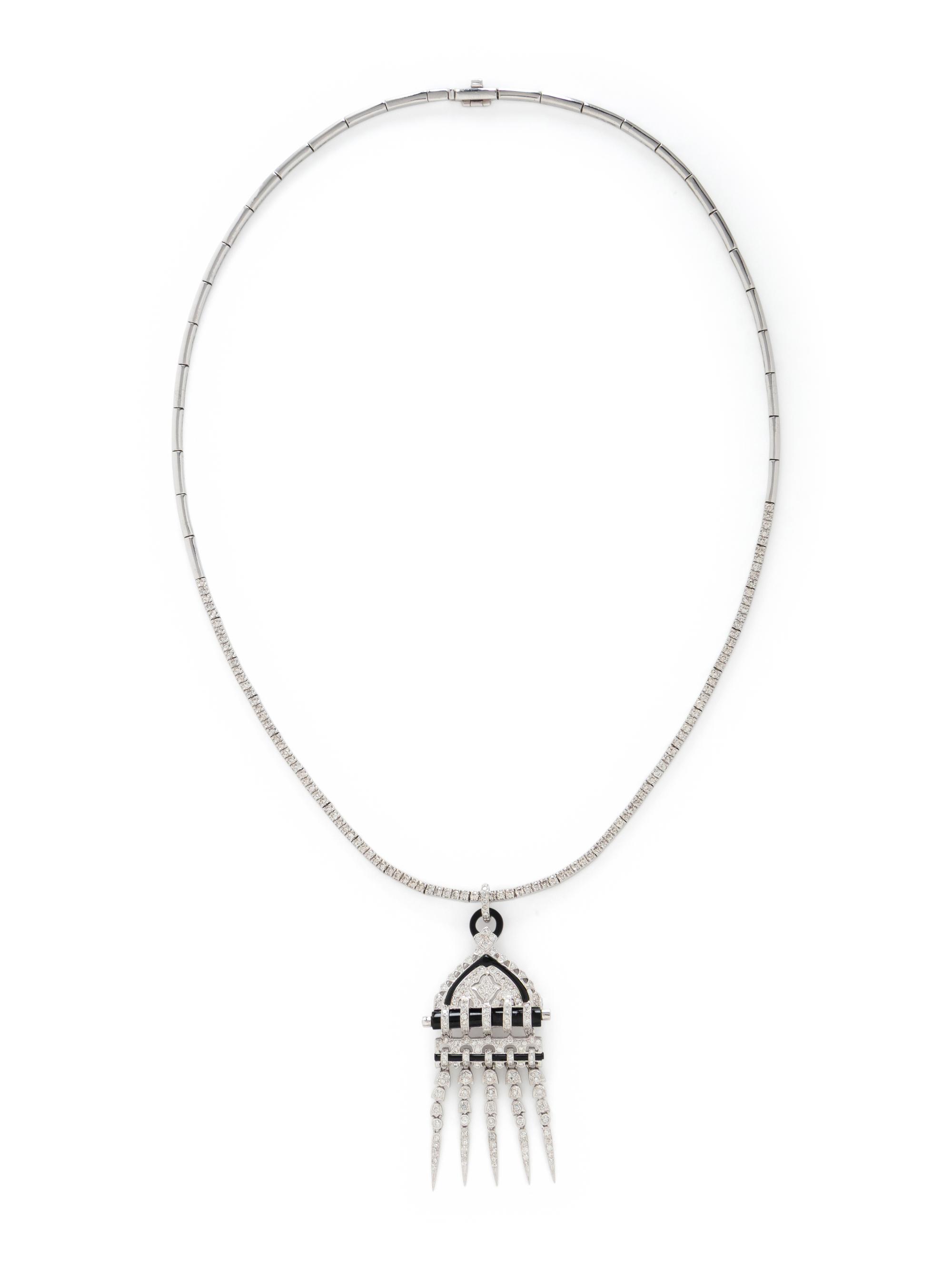 DIAMOND, BLACK ONYX, AND WHITE GOLD PENDANT NECKLACE