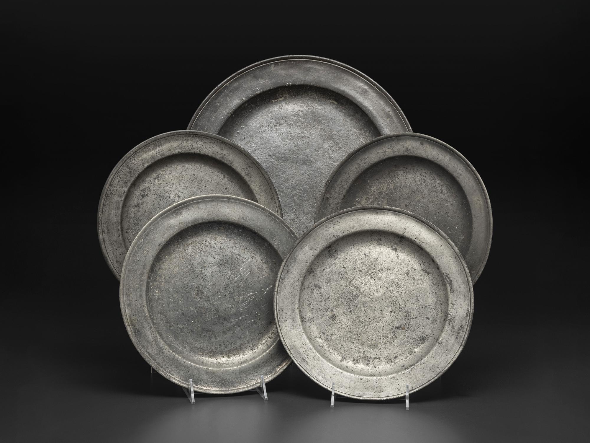 Five English Pewter Chargers