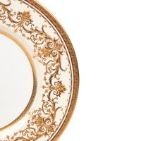A Set of Twelve Minton Parcel-Gilt Porcelain Plates