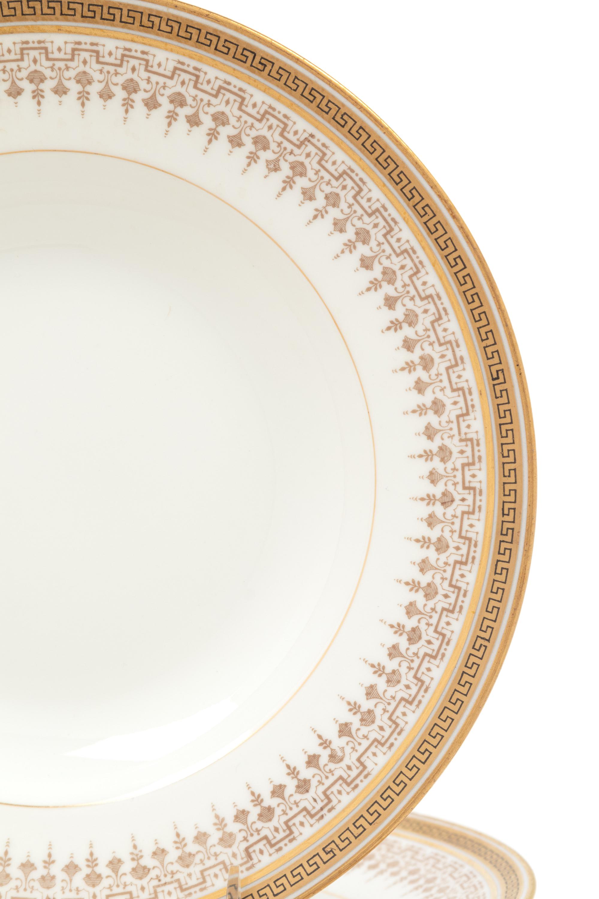 A Set of Twelve French Porcelain Soup Plates