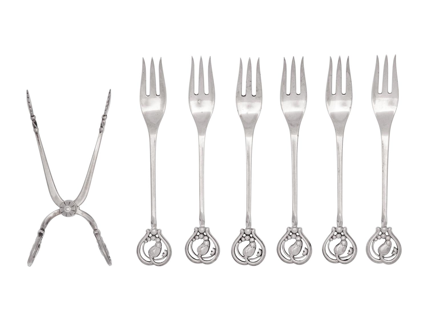 A Set of Six Georg Jensen Silver Flat Blossom Pattern Cocktail Forks