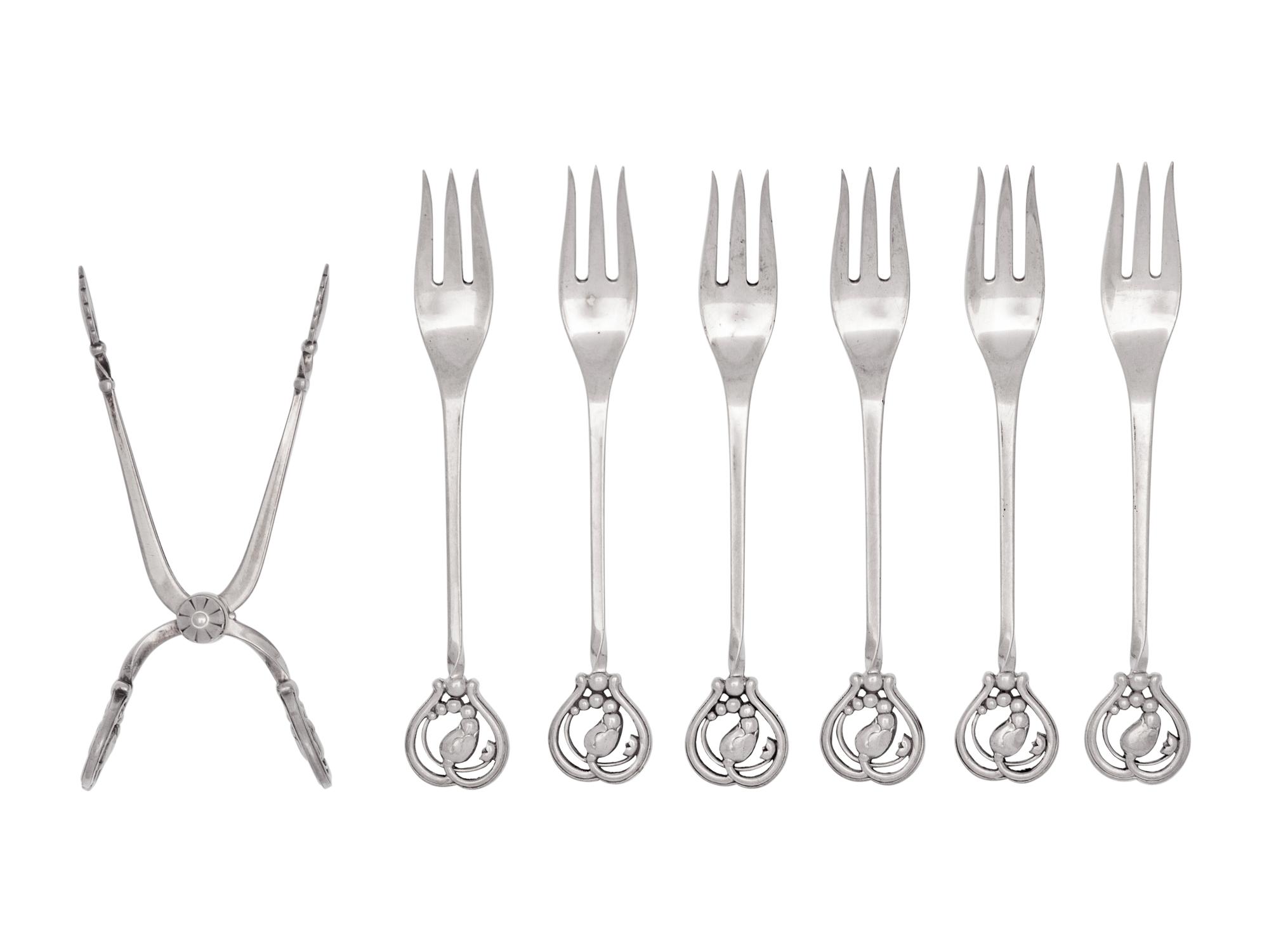 A Set of Six Georg Jensen Silver Flat Blossom Pattern Cocktail Forks