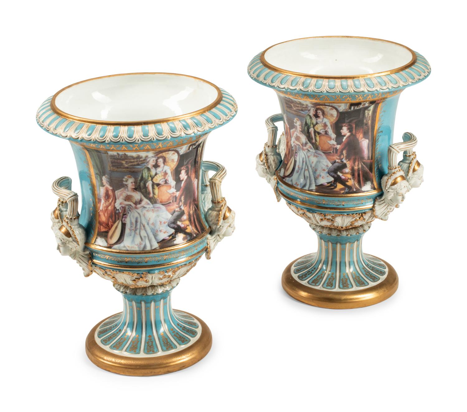 A Pair of Sèvres Style Porcelain Urns