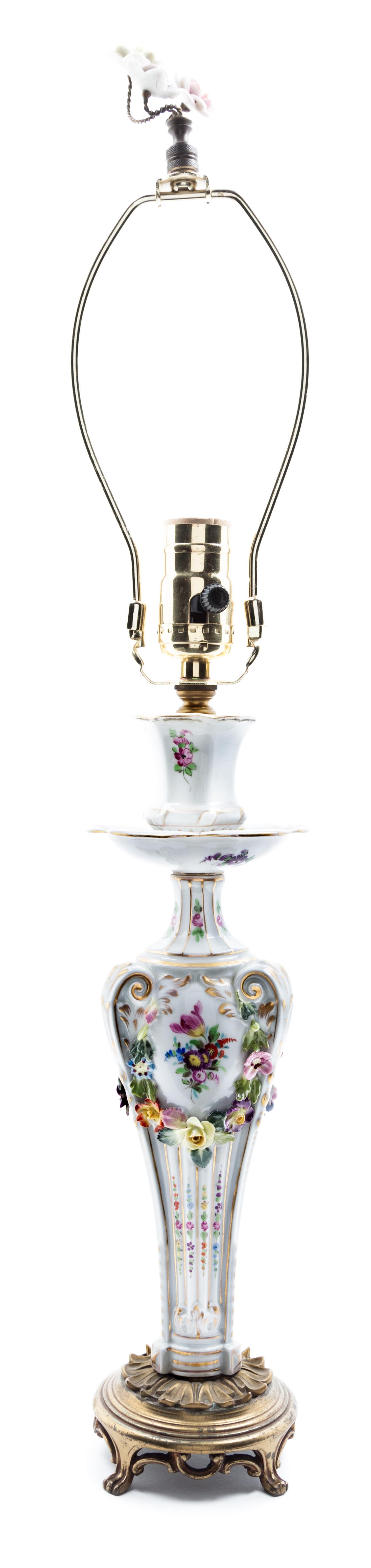 A Continental Porcelain Lamp Height 24 1/2 inches.