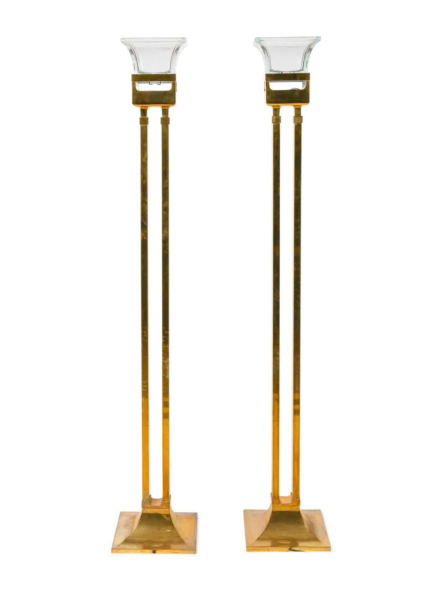 A Pair of Chapman Polished Brass Fire and Ice Torchères