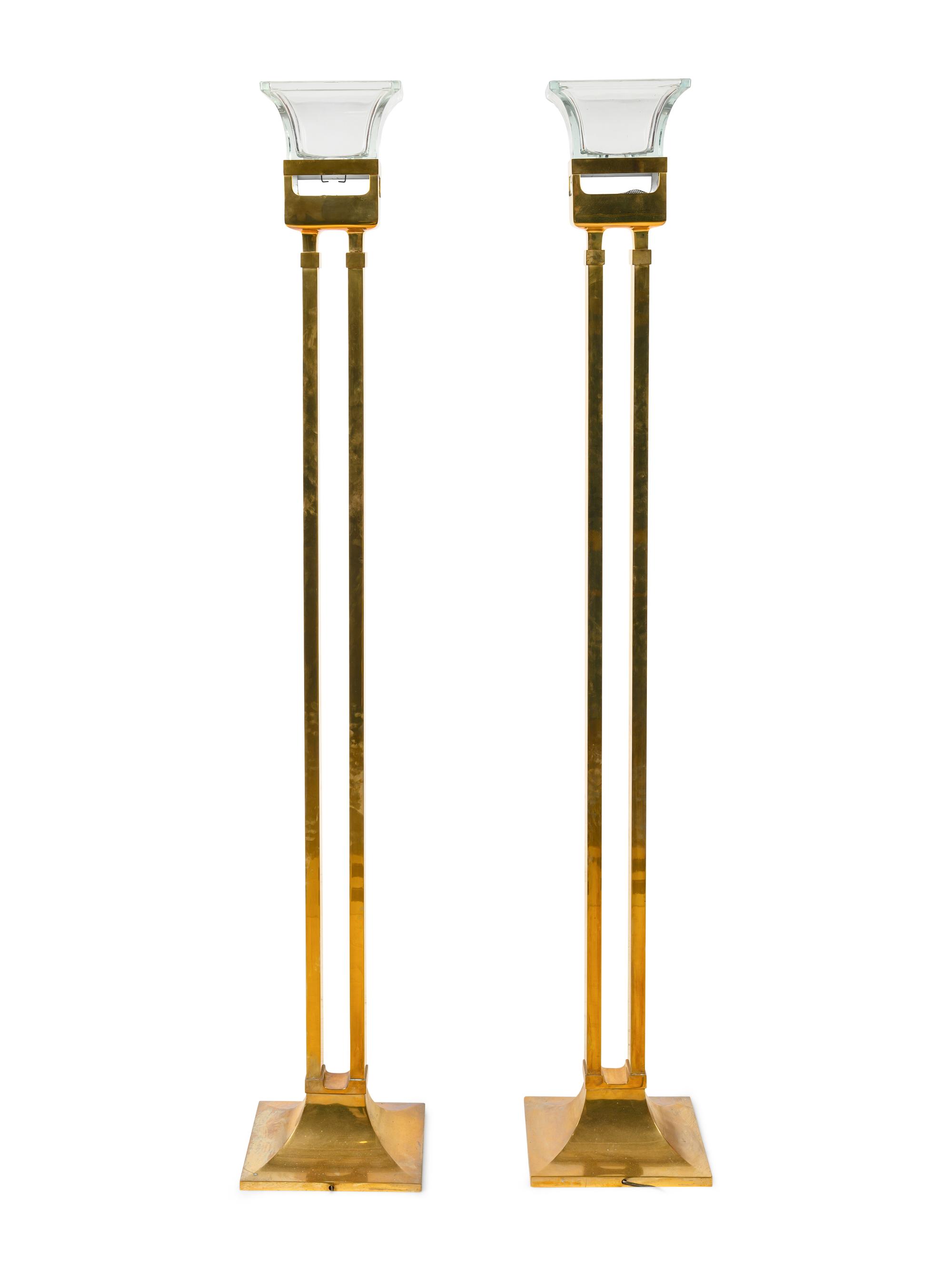 A Pair of Chapman Polished Brass Fire and Ice Torchères