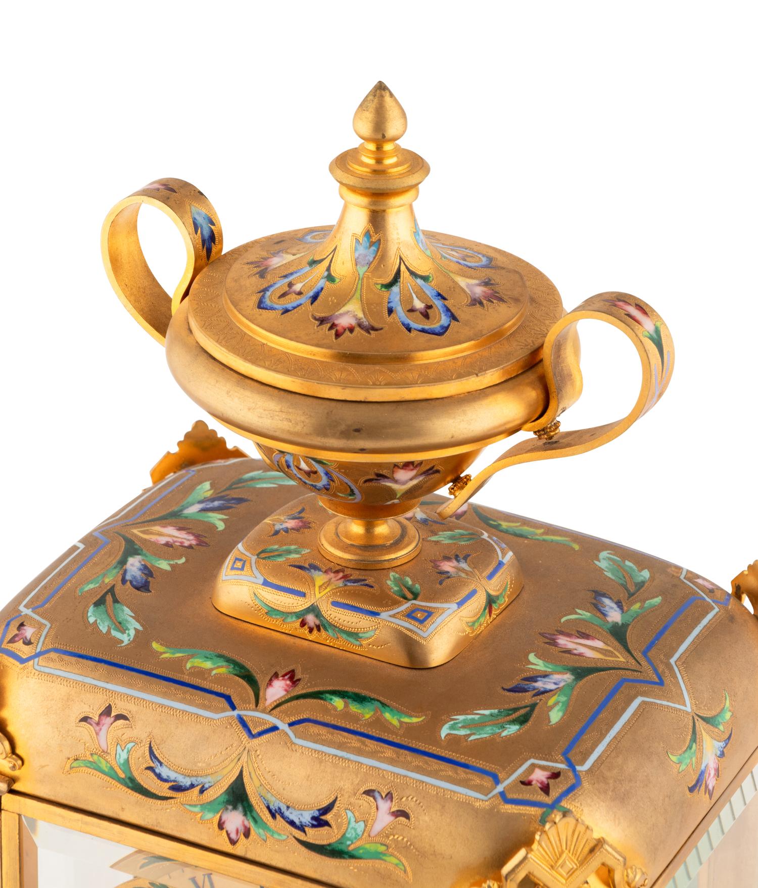 An English Champlevé Enamel and Gilt Bronze Clock Garniture