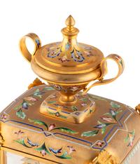 An English Champlevé Enamel and Gilt Bronze Clock Garniture