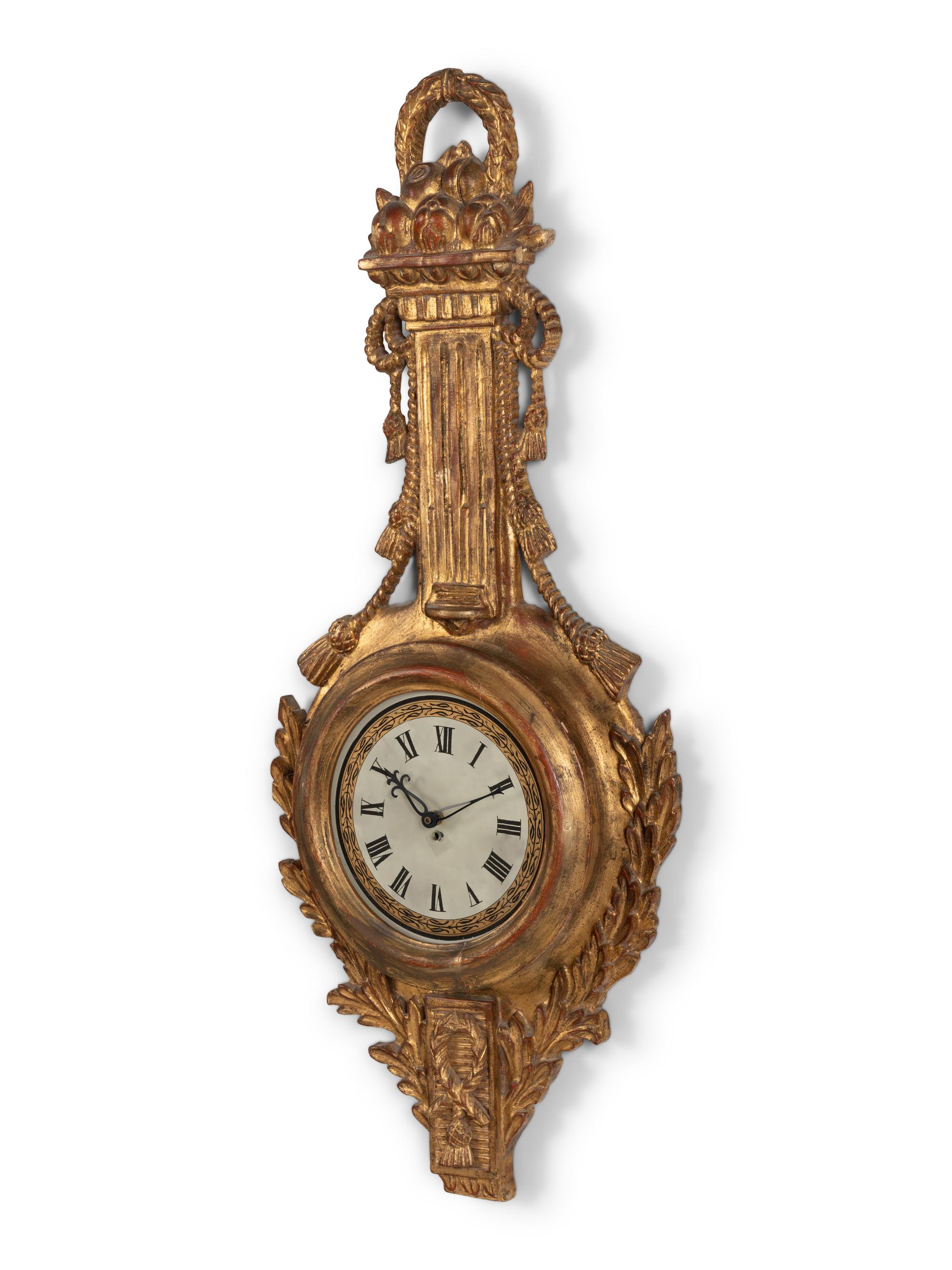 A Louis XVI Style Giltwood Cartel Clock