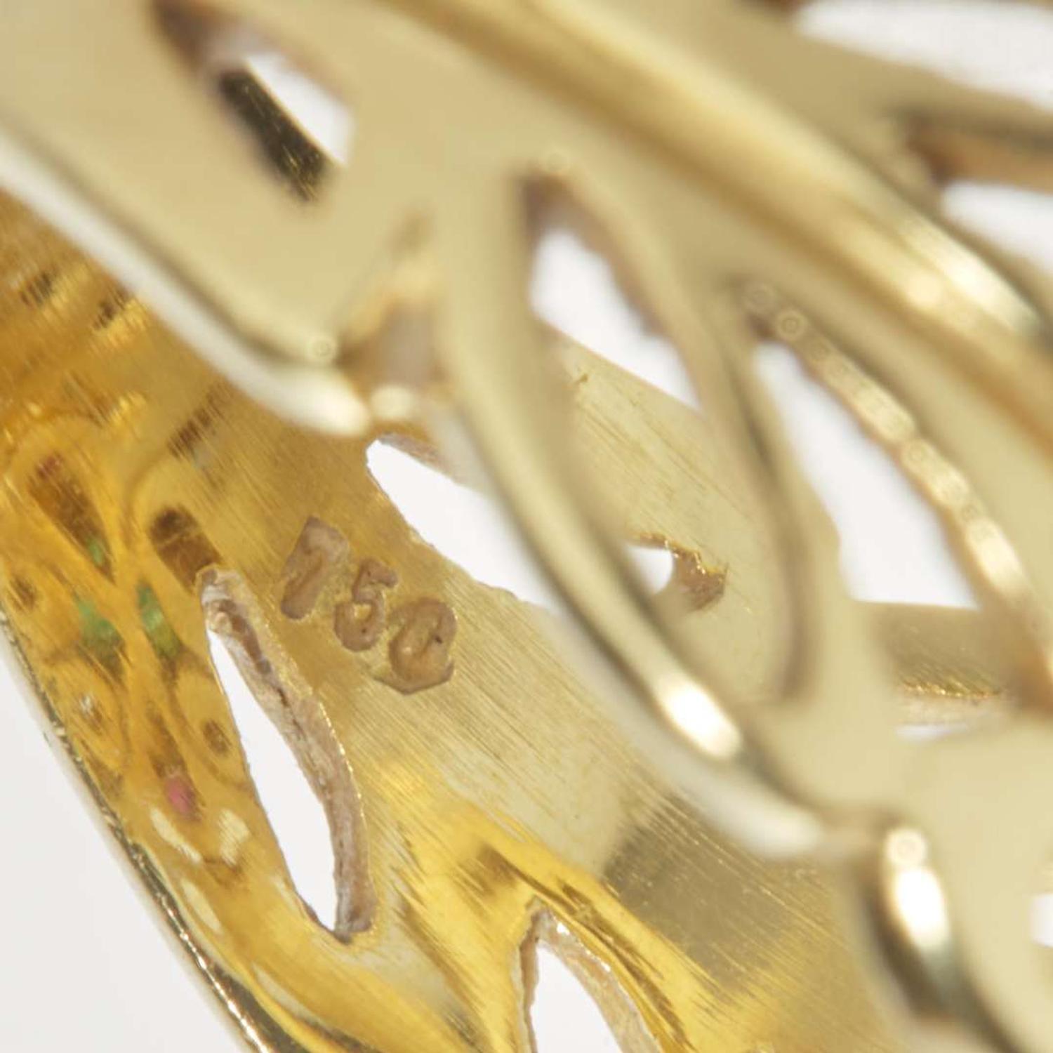 An 18K Yellow Gold and Gemstone Ring