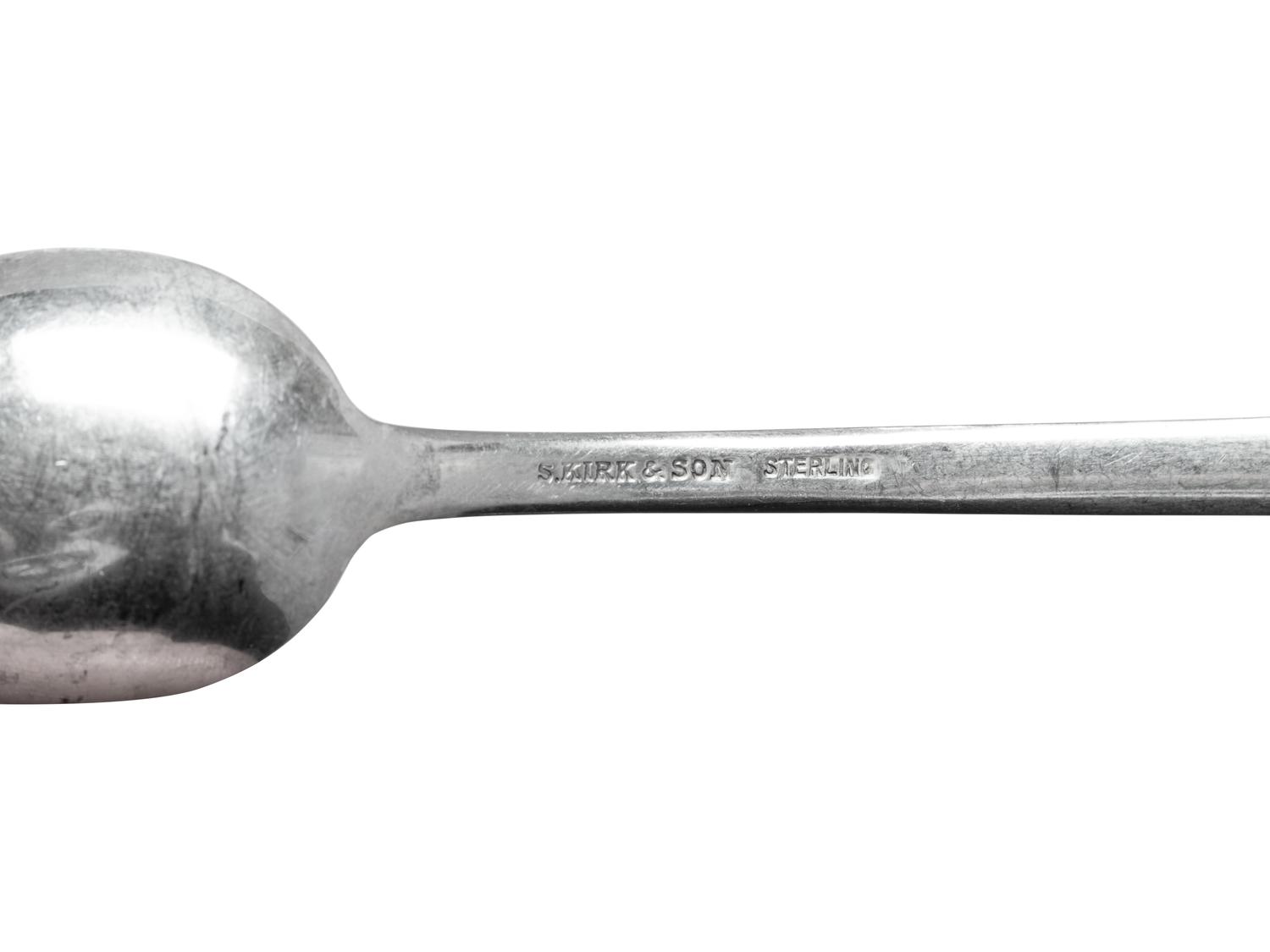 A Large S. Kirk and Son Repousse Silver Flatware Service