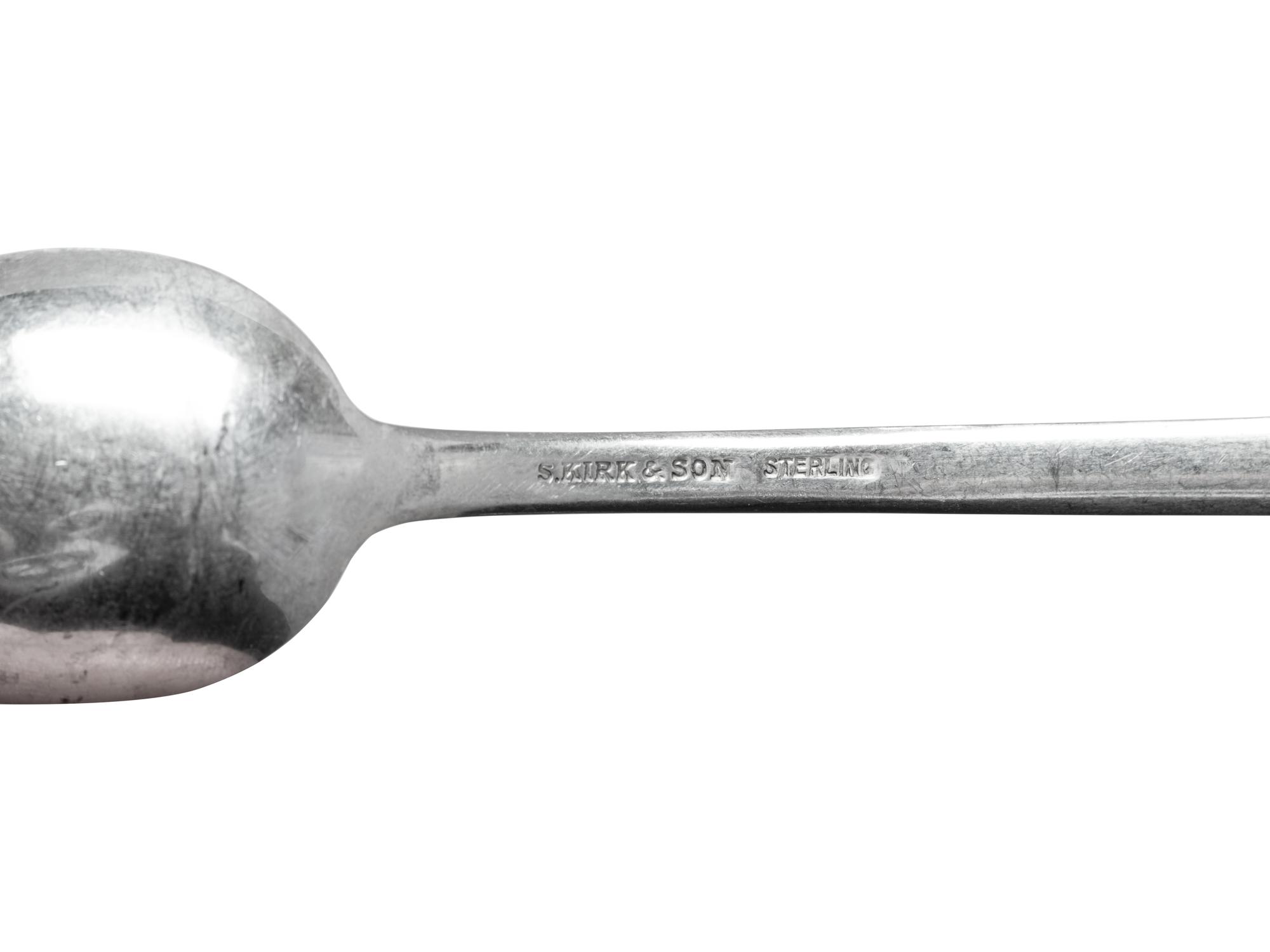 A Large S. Kirk and Son Repousse Silver Flatware Service