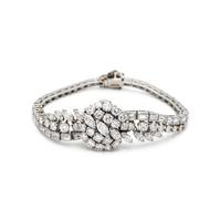 FRENCH, PLATINUM AND DIAMOND SURPRISE WATCH