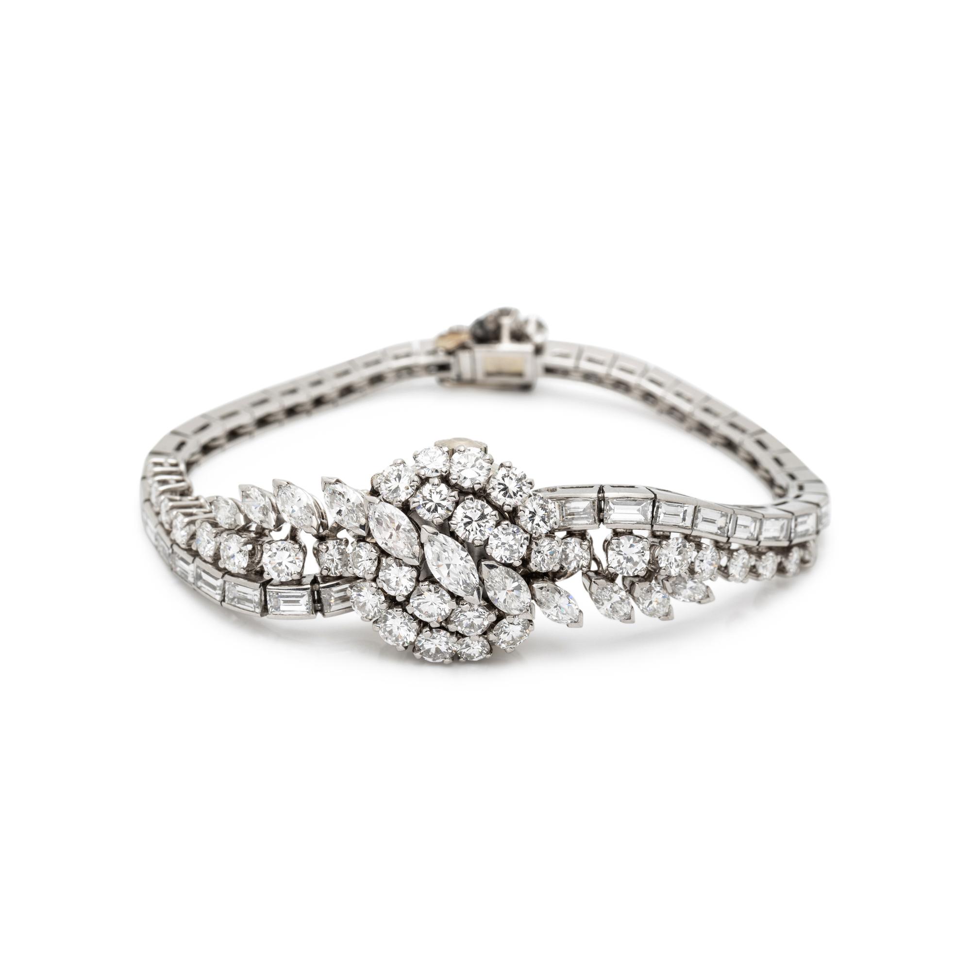 FRENCH, PLATINUM AND DIAMOND SURPRISE WATCH