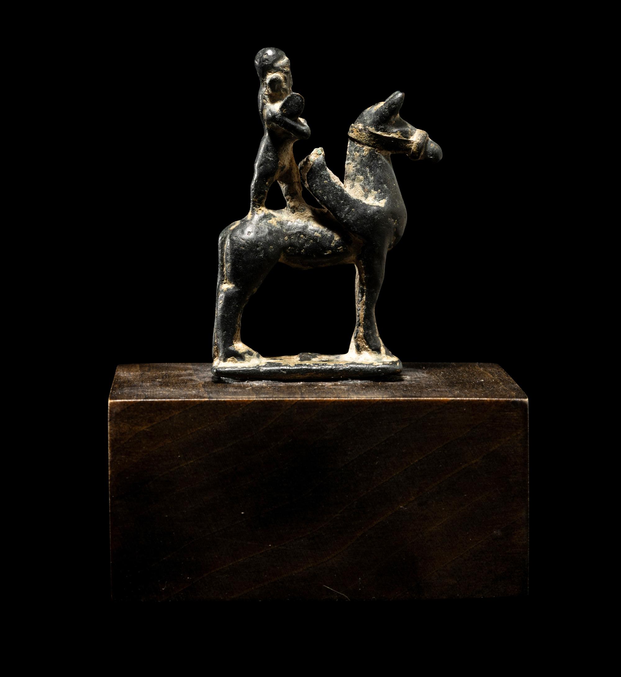 A Near Eastern Bronze Winged Horse and Rider