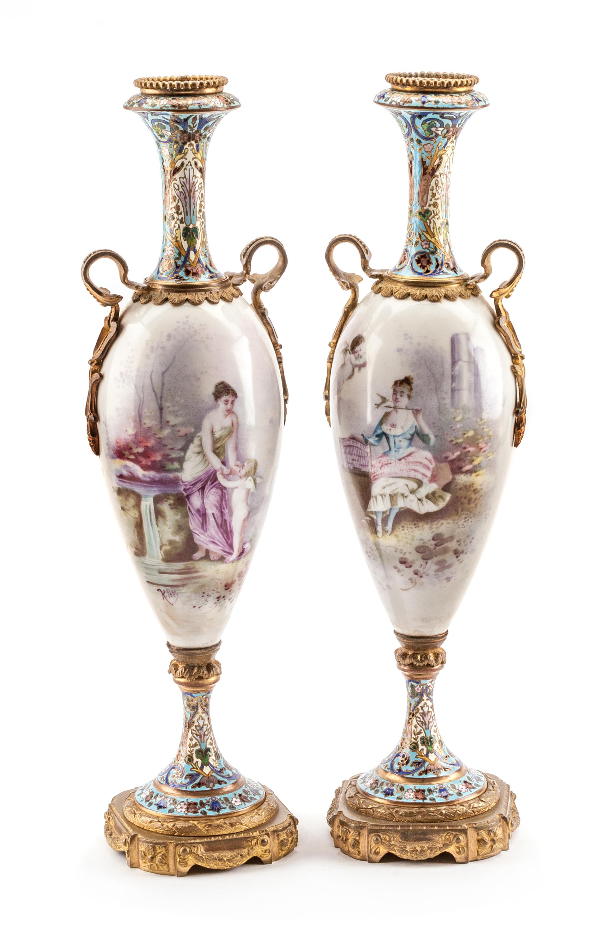A Pair of French Porcelain and Champleve Urns Height 19 1/2 inches. — 19TH CENTURY