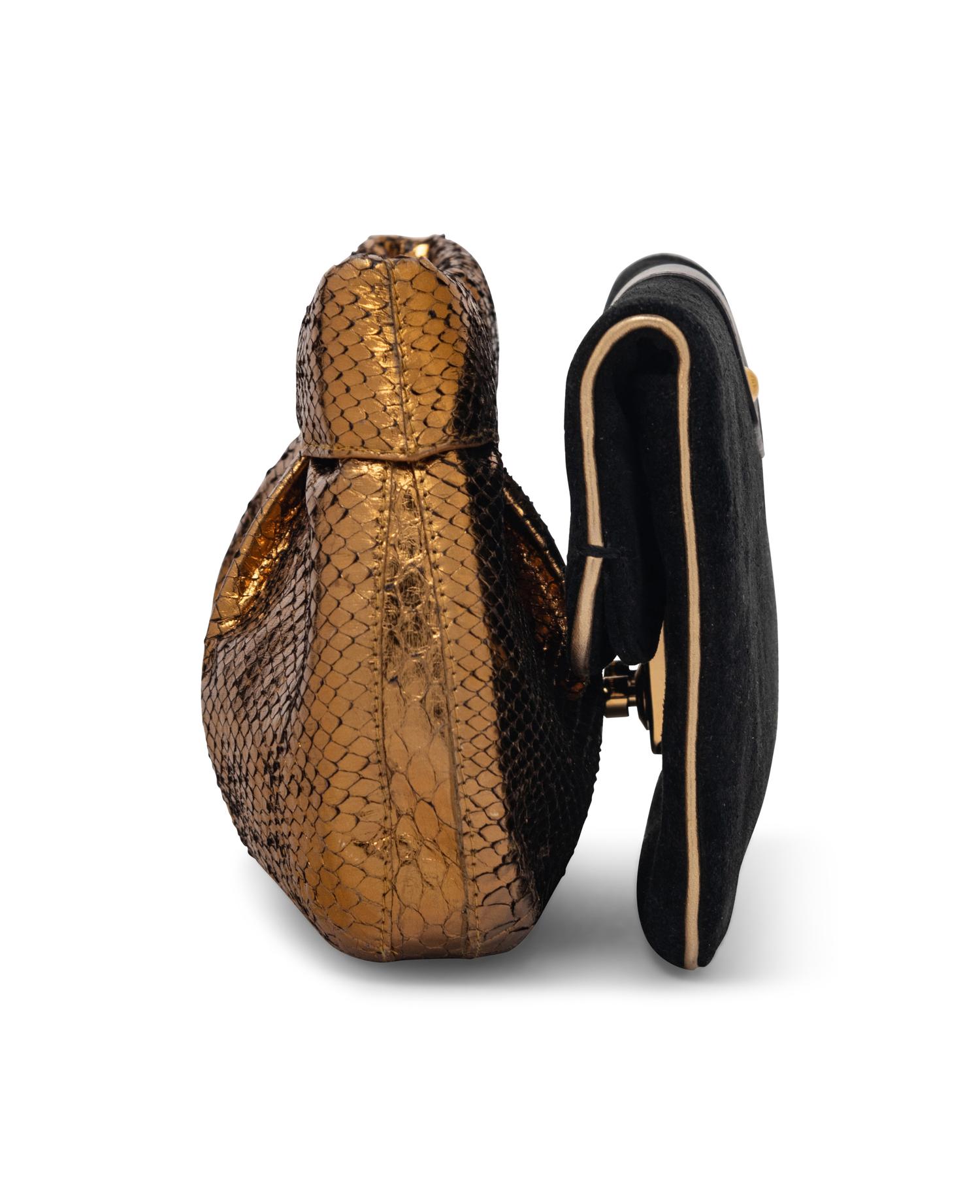 Two Clutches by Louis Vuitton and Nancy Gonzalez
