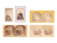[EARLY PHOTOGRAPHY]. A group of "spirit" CDVs and stereoviews, depicting "ghostly" apparitions.