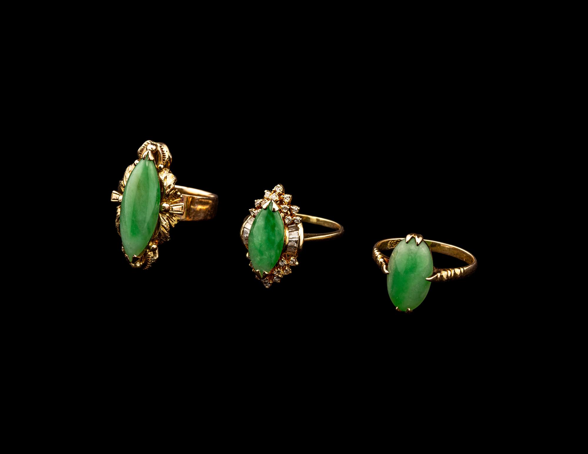 Three Chinese Apple Green Inset Gold Mounted Rings