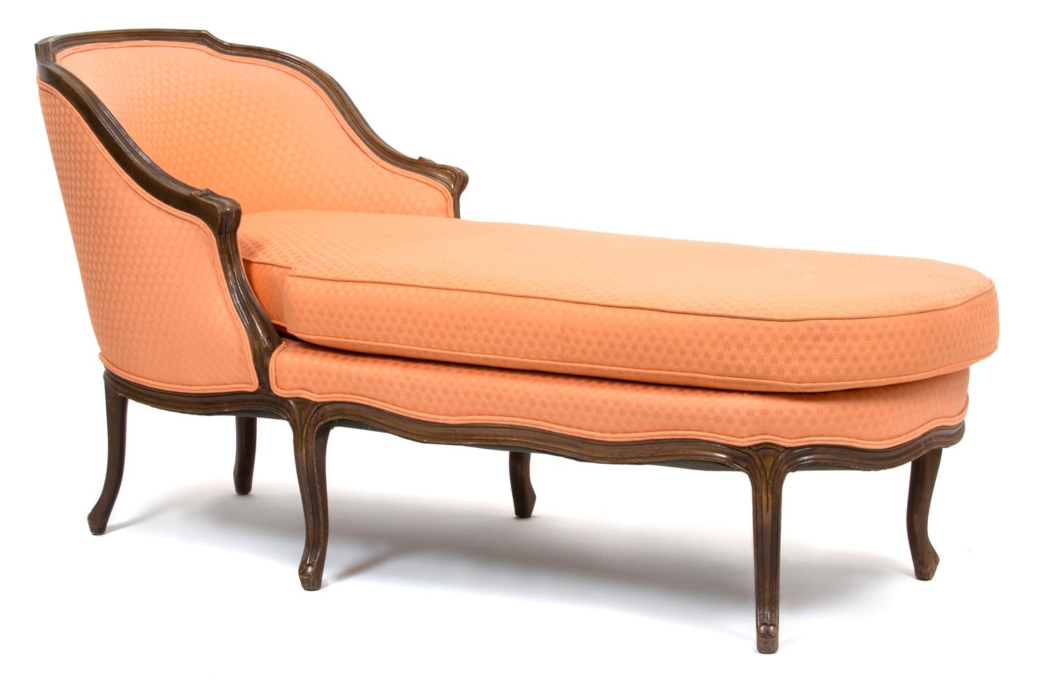 A Louis XV Style Carved Walnut and Upholstered Chaise Lounge Height 34 1/4 x length 69 inches. — 19TH CENTURY