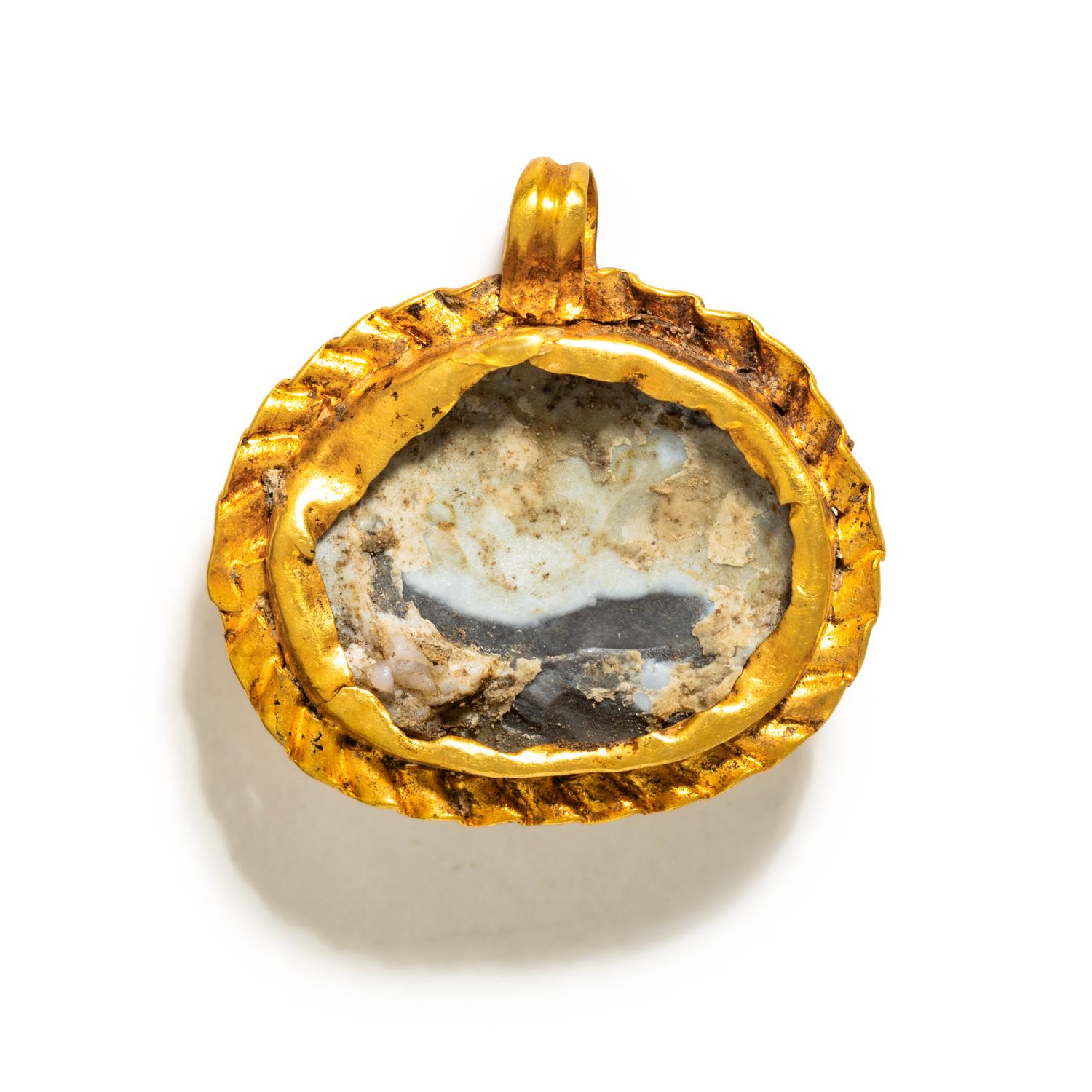 A Roman Gold and Onyx Double-Portrait Cameo Pendant