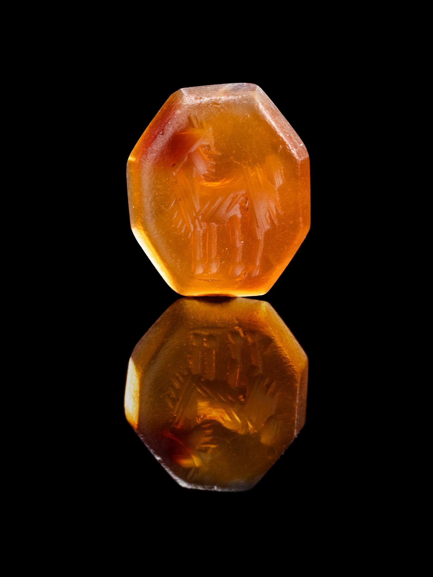 A Roman Carnelian Ring Stone with a Mythological Creature