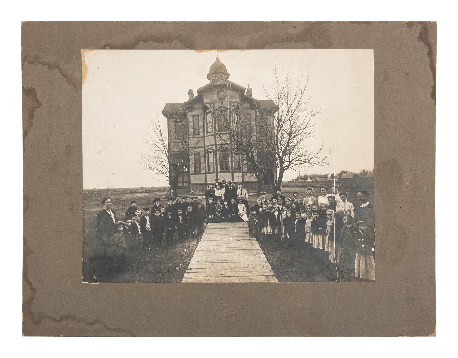 [EARLY PHOTOGRAPHY]. A collection of photographs featuring various building exteriors and interiors.