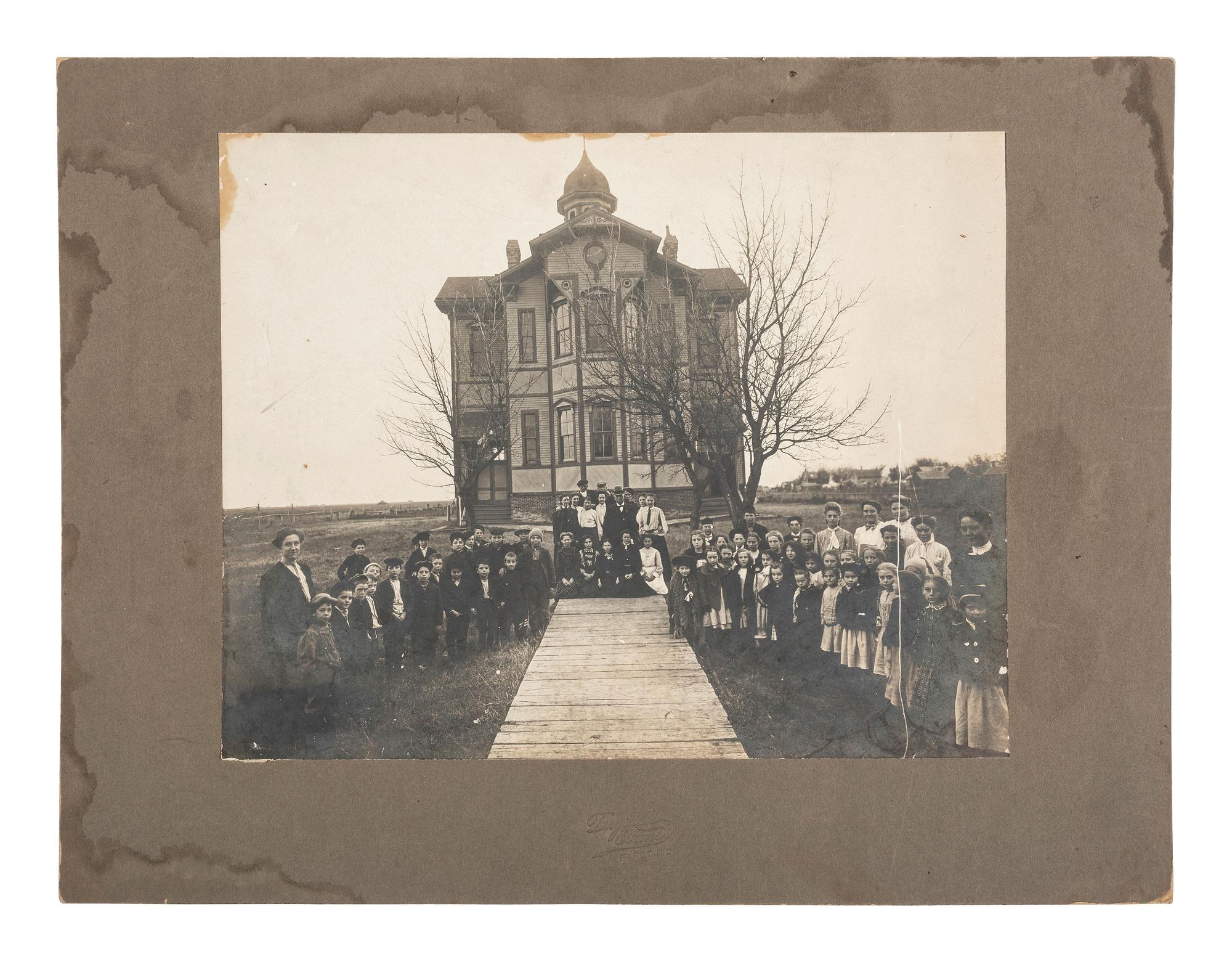 [EARLY PHOTOGRAPHY]. A collection of photographs featuring various building exteriors and interiors.