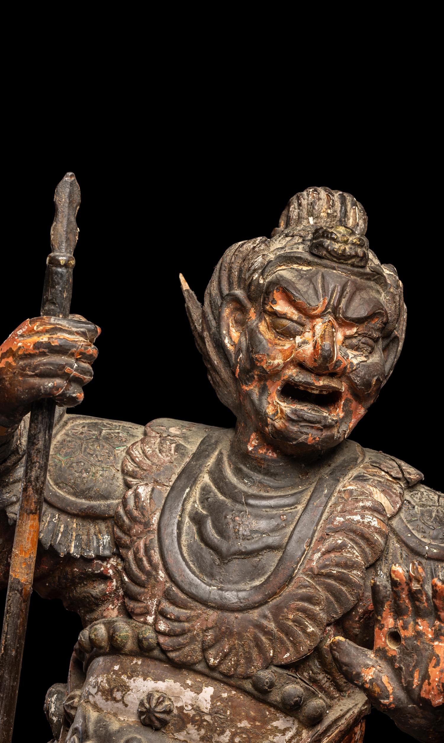 A Japanese Polychrome Painted Wood Figure of a Guardian