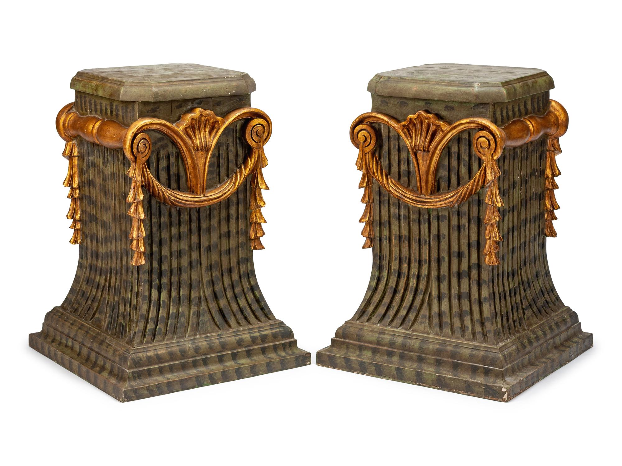 A Pair of Italian Painted and Parcel Gilt Pedestals