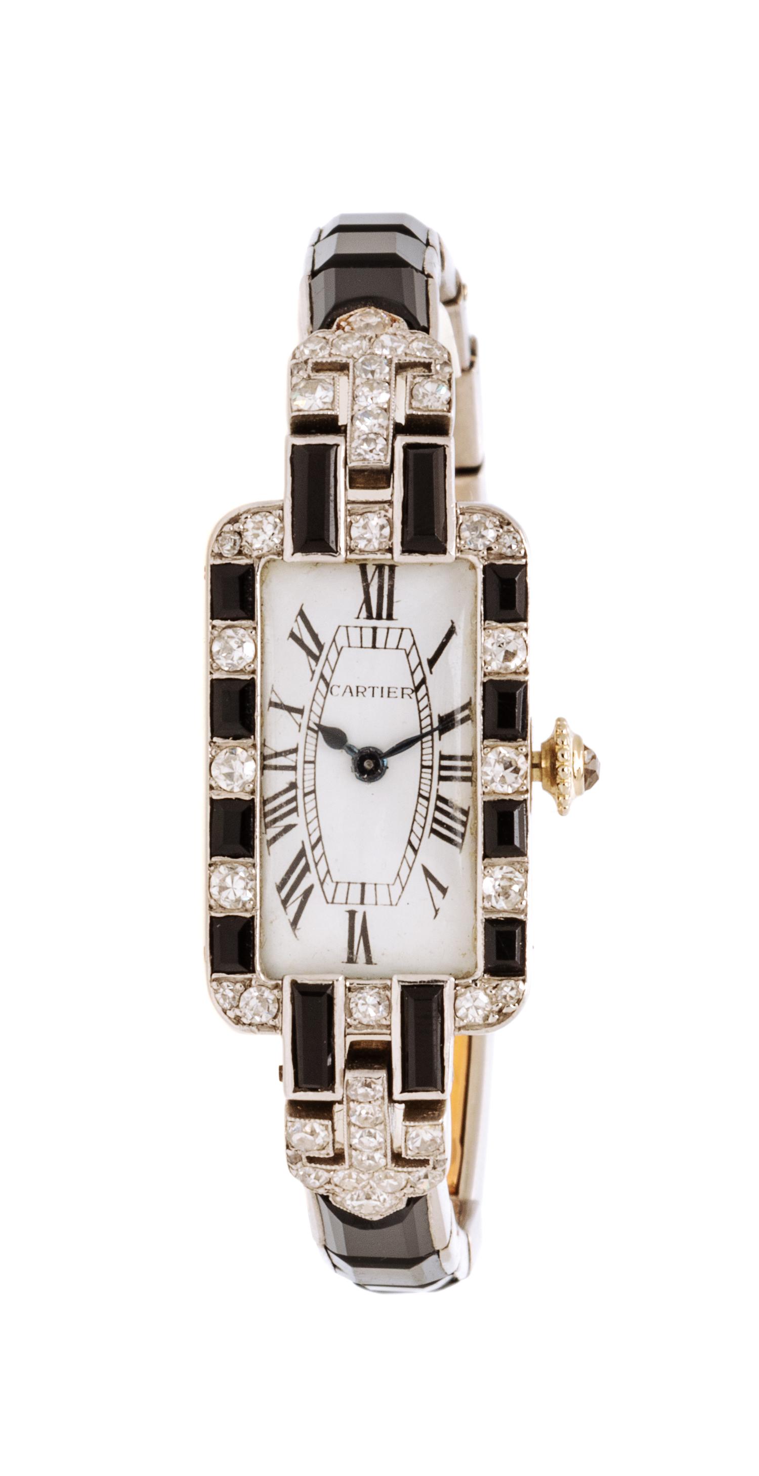 An Art Deco Platinum, Diamond and Onyx Wristwatch, Cartier, 25.51 dwts.