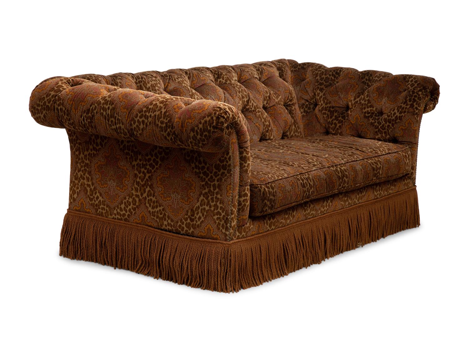 A Chesterfield Style Velvet-Upholstered Sofa with a Fringed Skirt