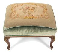 A George II Style Carved Mahogany Library Chair and Ottoman — LATE 19TH CENTURY