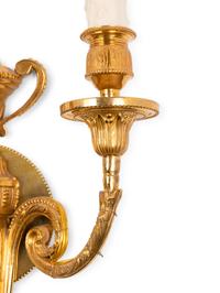 A Pair of Louis XVI Style Gilt Metal Two-Light Sconces