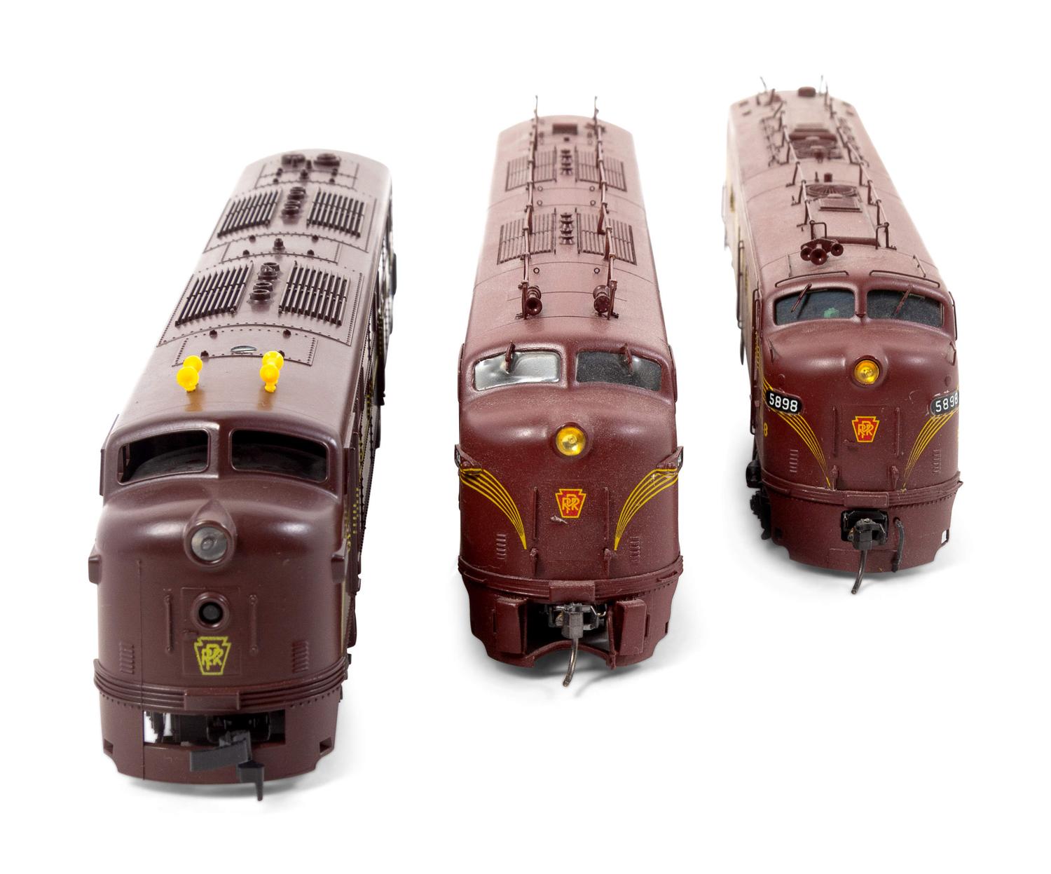 A Group of Three Samhongsa Polychrome HO-Gauge Pennsylvania Railroad Diesel Locomotives