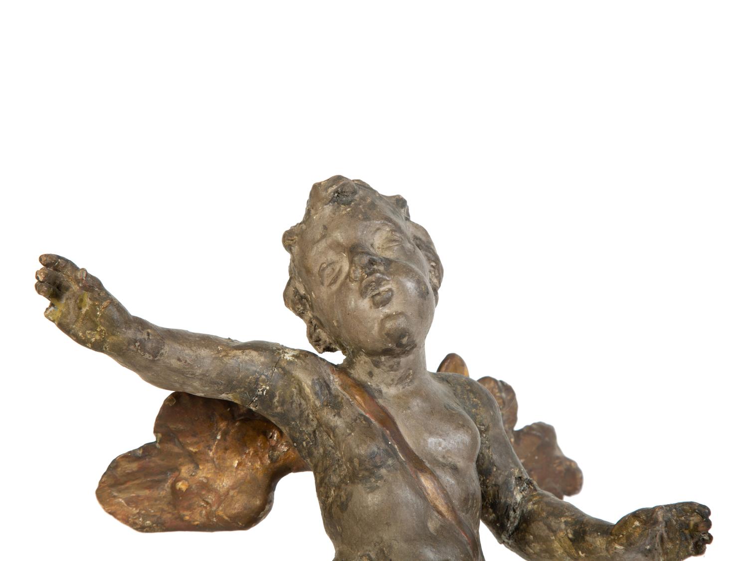 A Pair of Italian Carved Putti on Painted Faux-Marble Bases — 17TH/18TH CENTURY