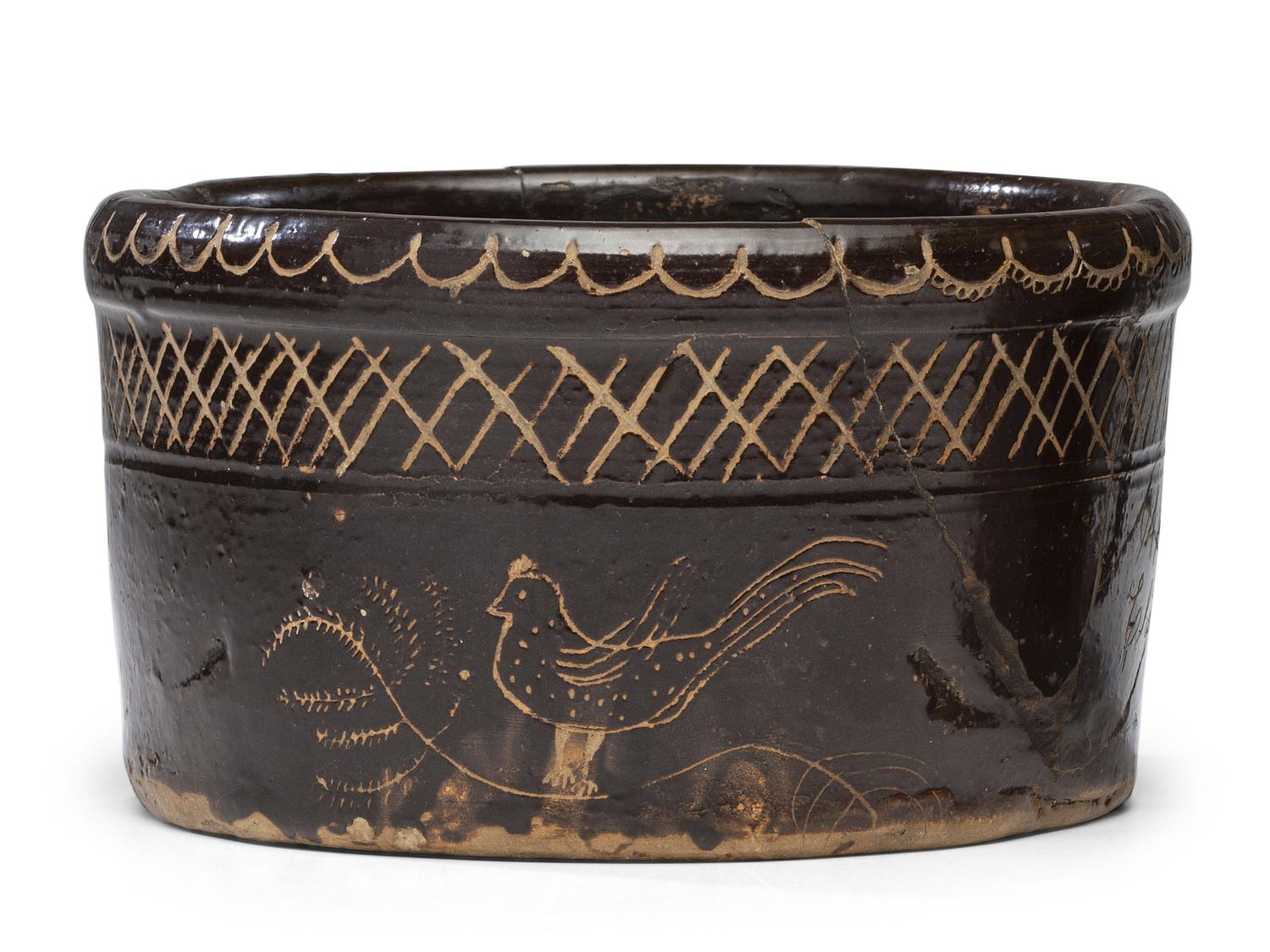 An Incised Albany Slip Presentation Butter Tub