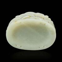 A Chinese pale celadon jade reticulated "Dragon" finial 青白玉镂空龙形炉端