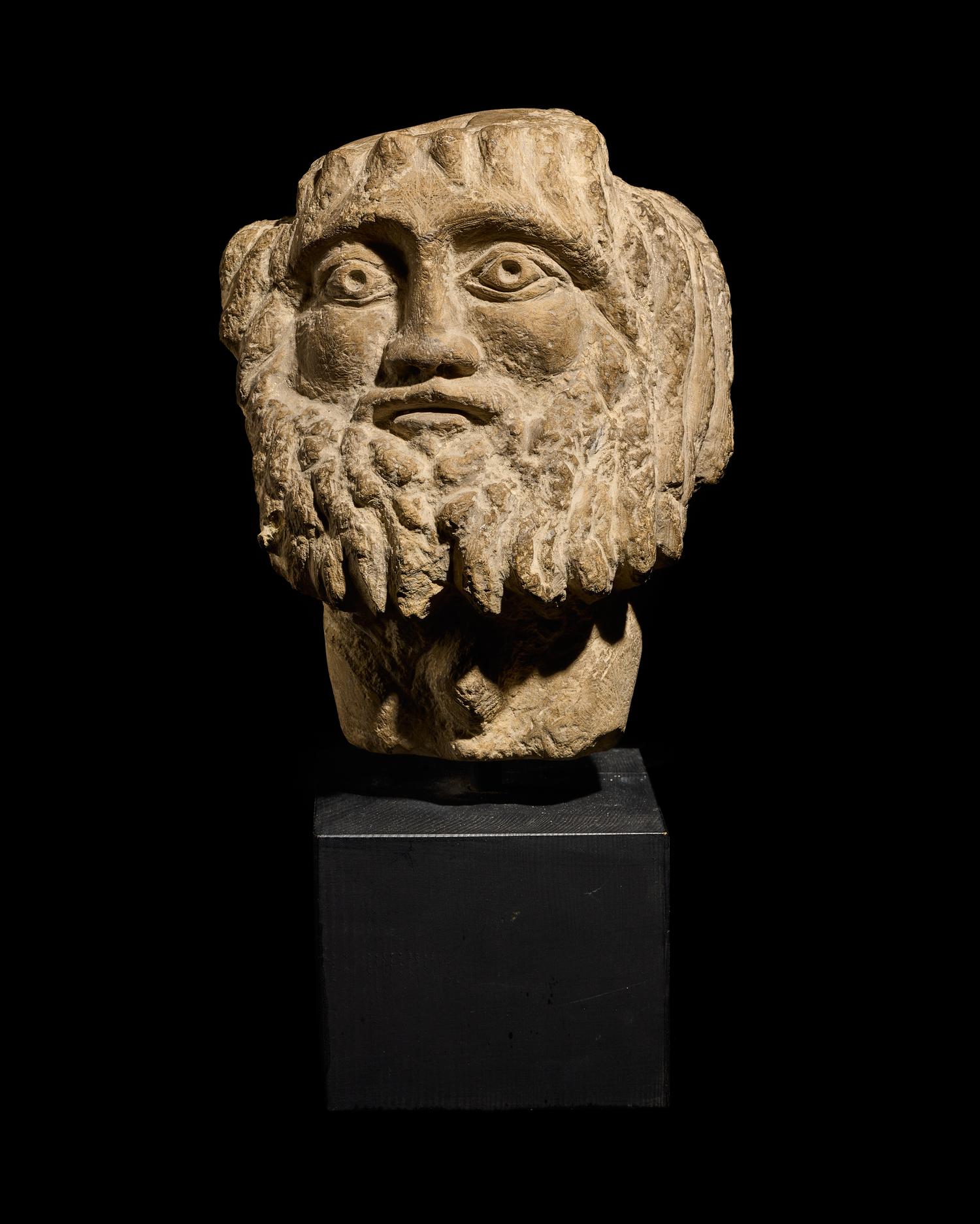 A Coptic Limestone Bust of Zeus