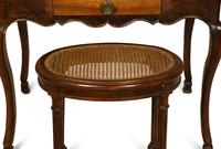A Louis XV Style Side Table with a Louis XV Style Caned Seat Stool